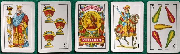 Image with some cards from a Spanish deck of cards.