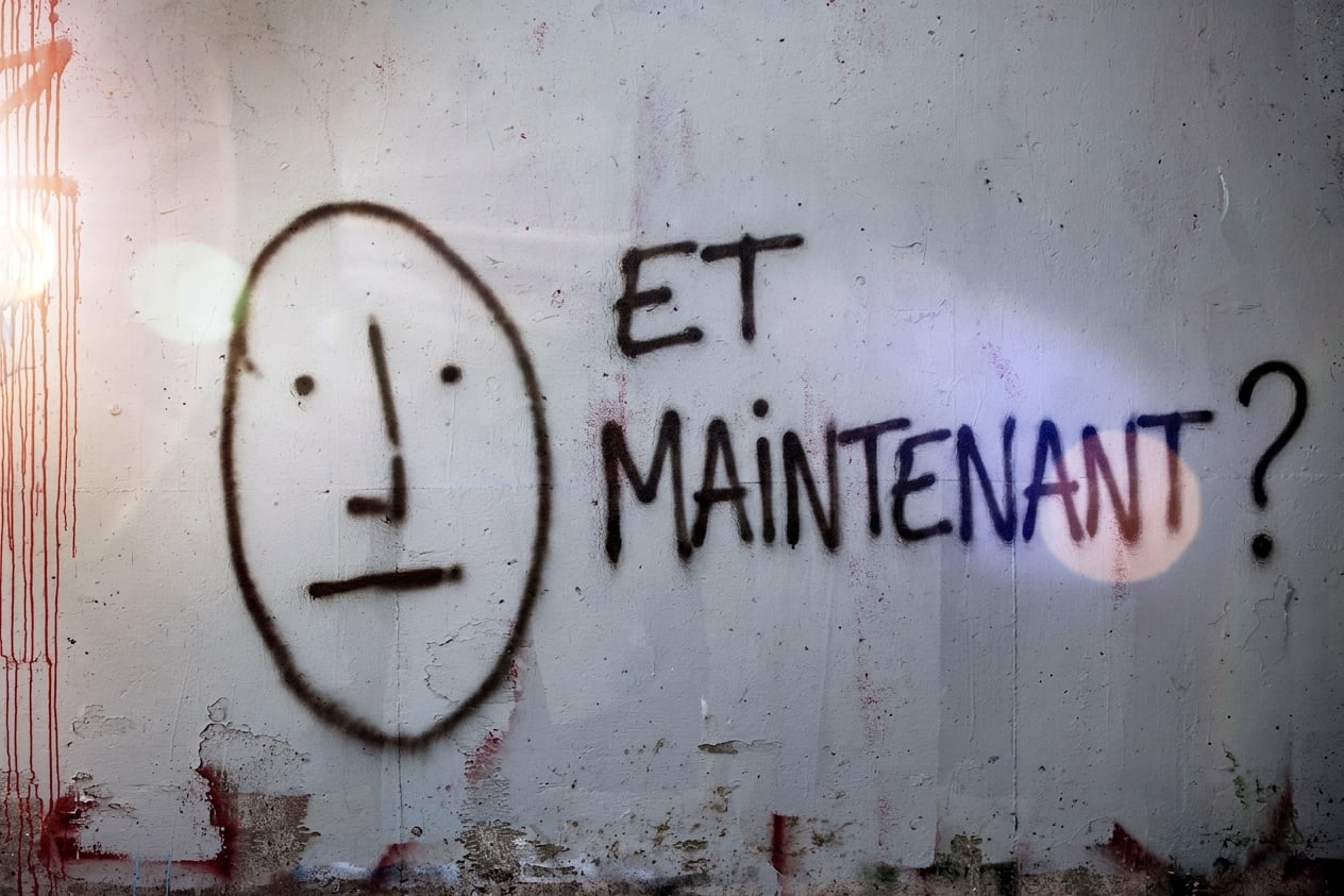 graffiti_on_a_wall_asking_what_now.jpg