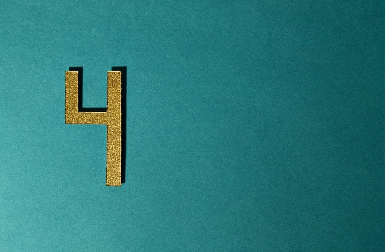 Image of a four on a green background