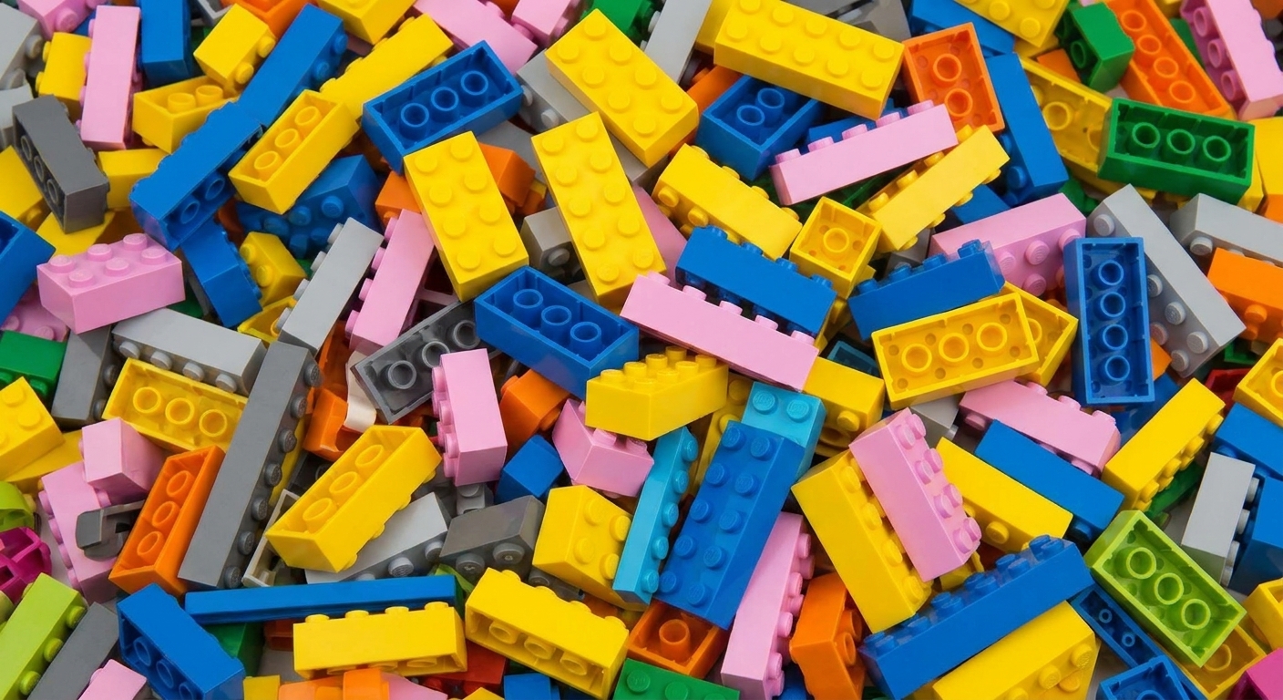 A visual of a heap of disarranged lego blocks