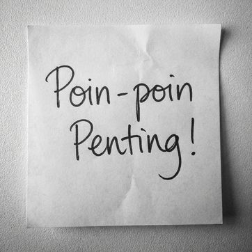 Secarik post-it dengan kata takeaways