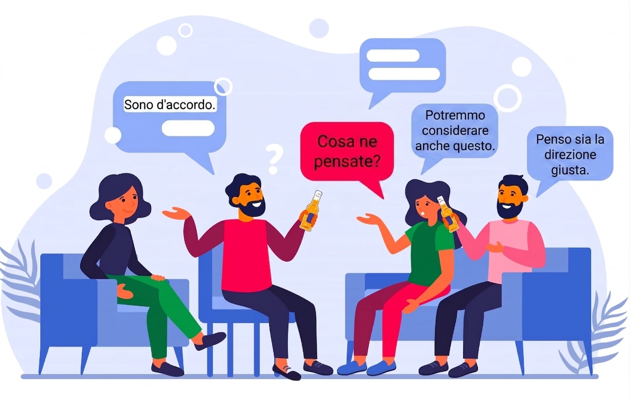 persone sedute che parlano in gruppo