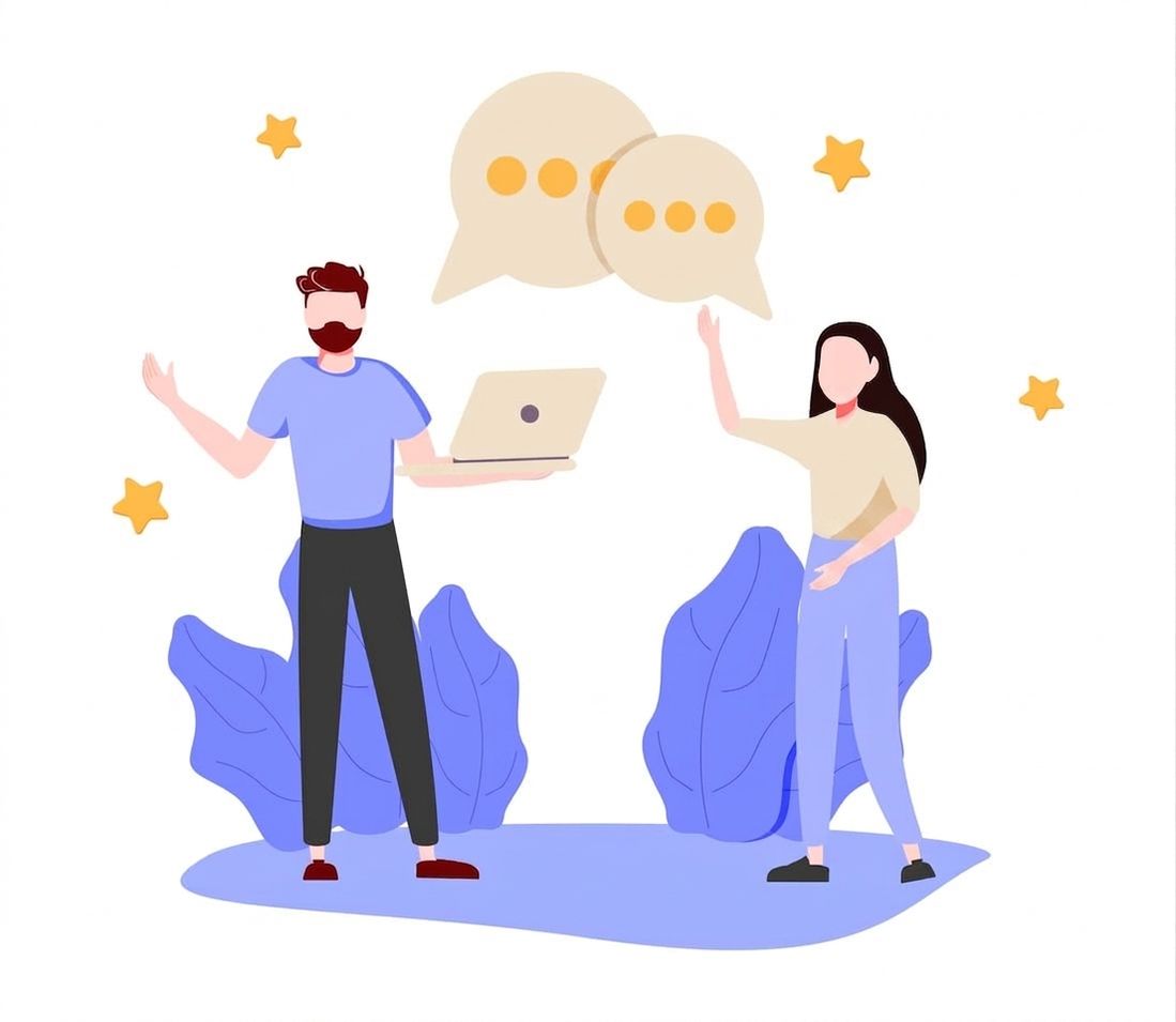 2人の同僚が互いにコミュニケーションを取っている様子を示すイラスト。吹き出しが2つあり、同僚の一人はノートパソコンを持っています。