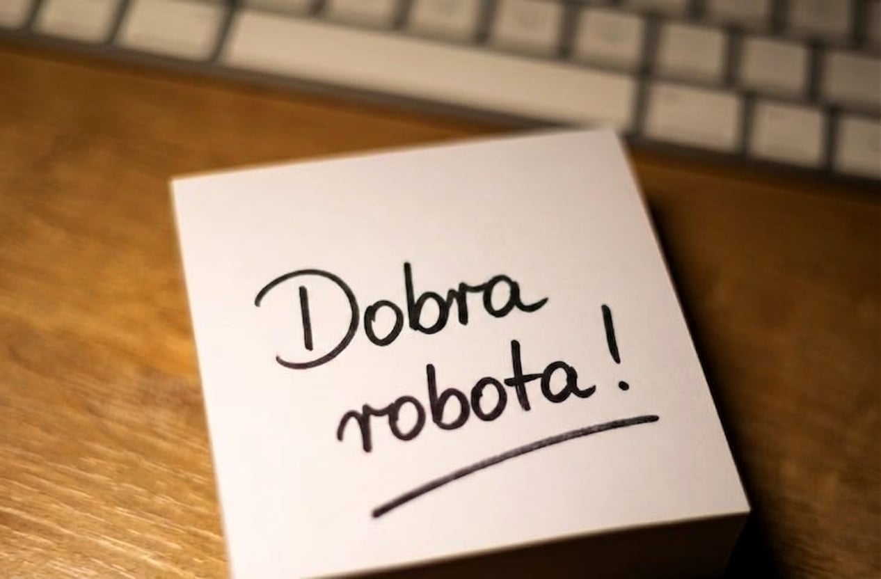 Kartka z napisem „well done" na przedniej stronie