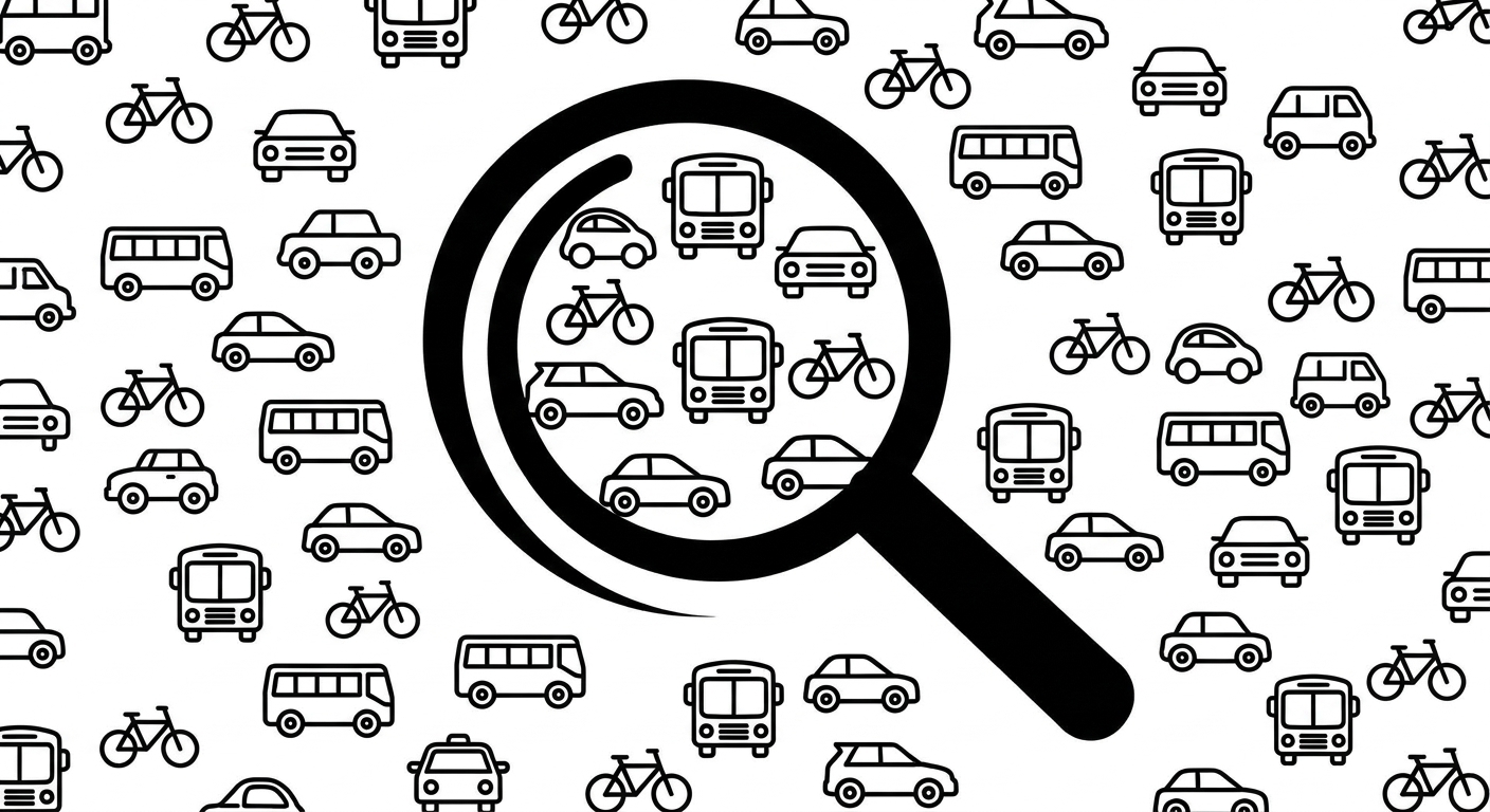 2 mașini, 1 autobuz, 1 bicicletă înconjurate de mai multe mașini, autobuze și biciclete
