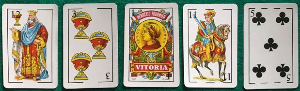 Image with some cards from a Spanish deck of cards.