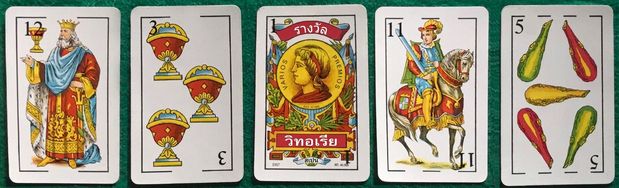 Image with some cards from a Spanish deck of cards.