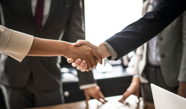 people shaking hands
