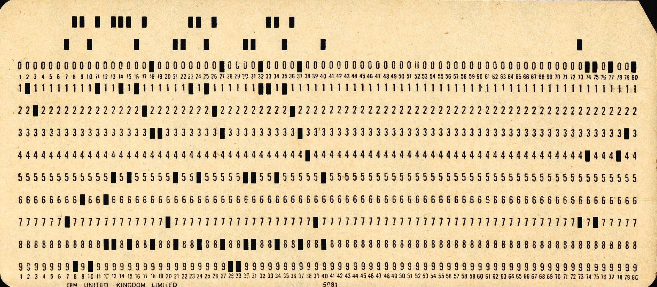 A picture of an old punched card used for programming computers.