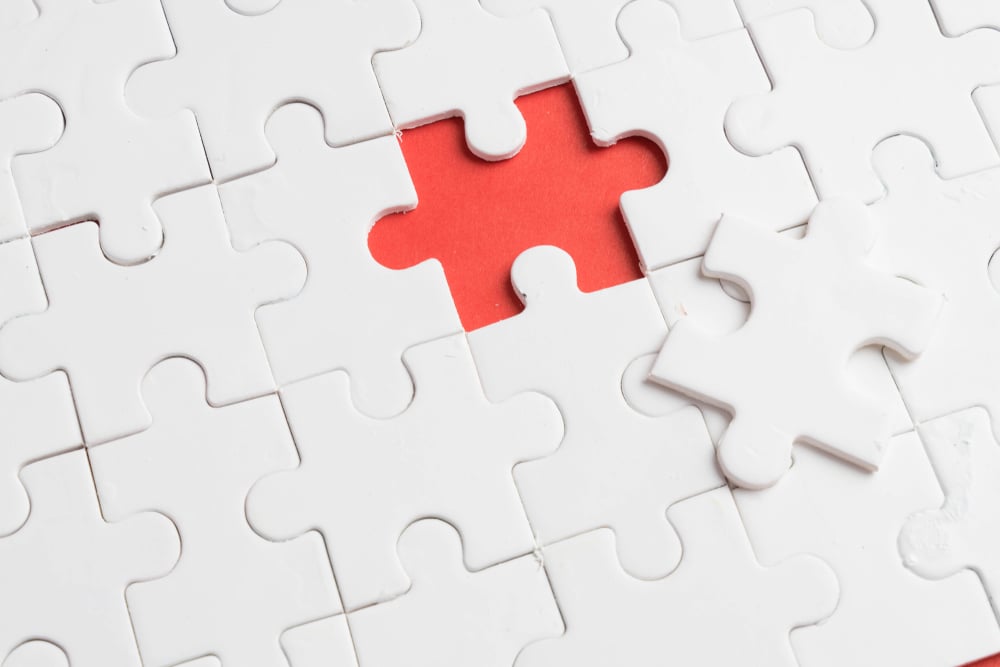 Puzzle with one missing piece