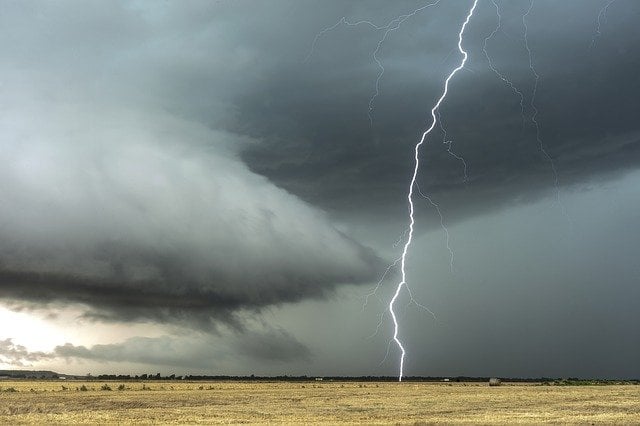 Heavy, dark clouds and a thunder.