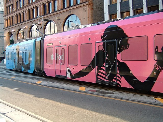 Tram showing iPod ads