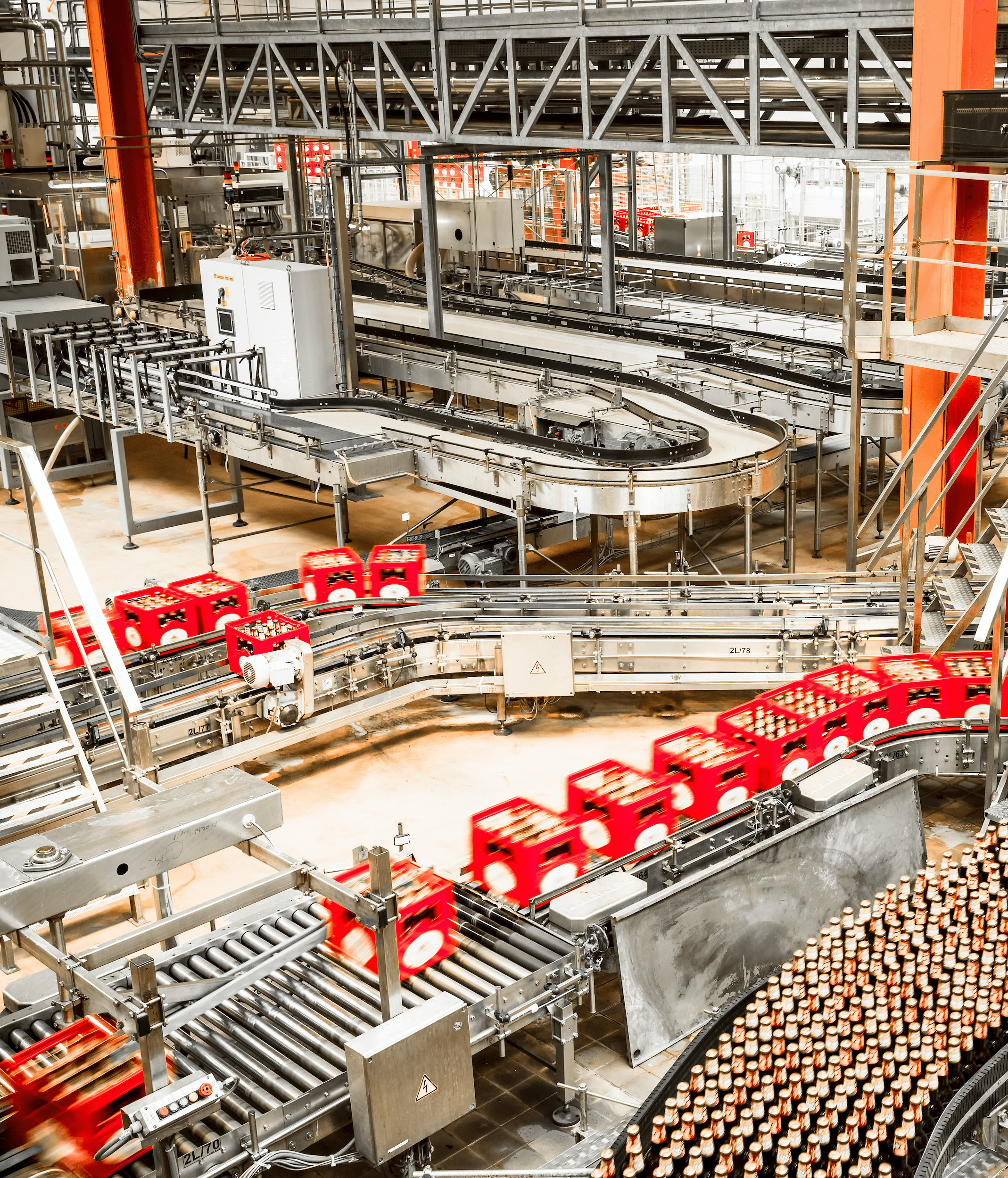 Photograph of a conveyor belt in a bottle factory