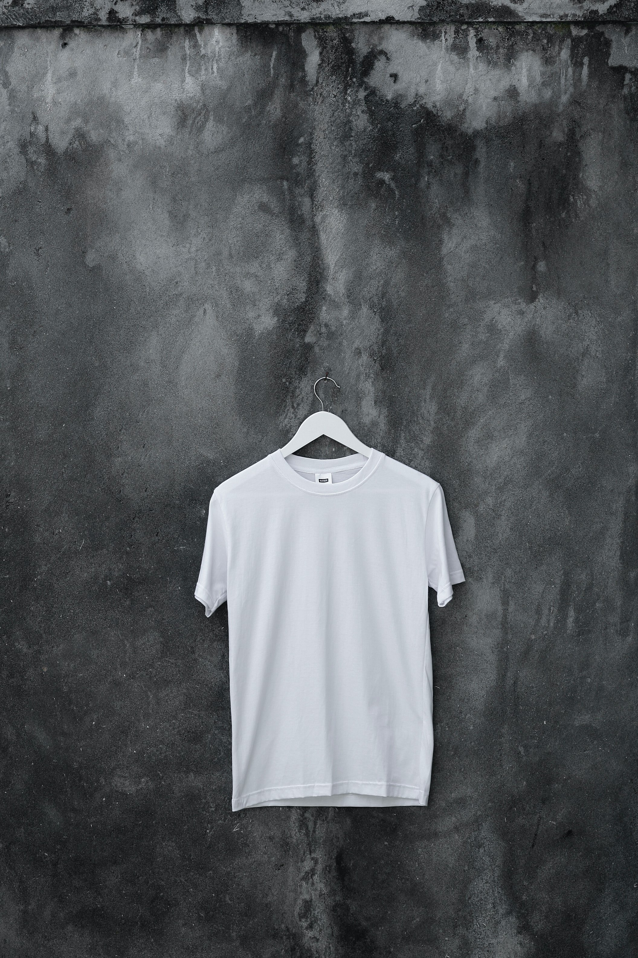 t_shirt_hanging_against_a_wall.jpg