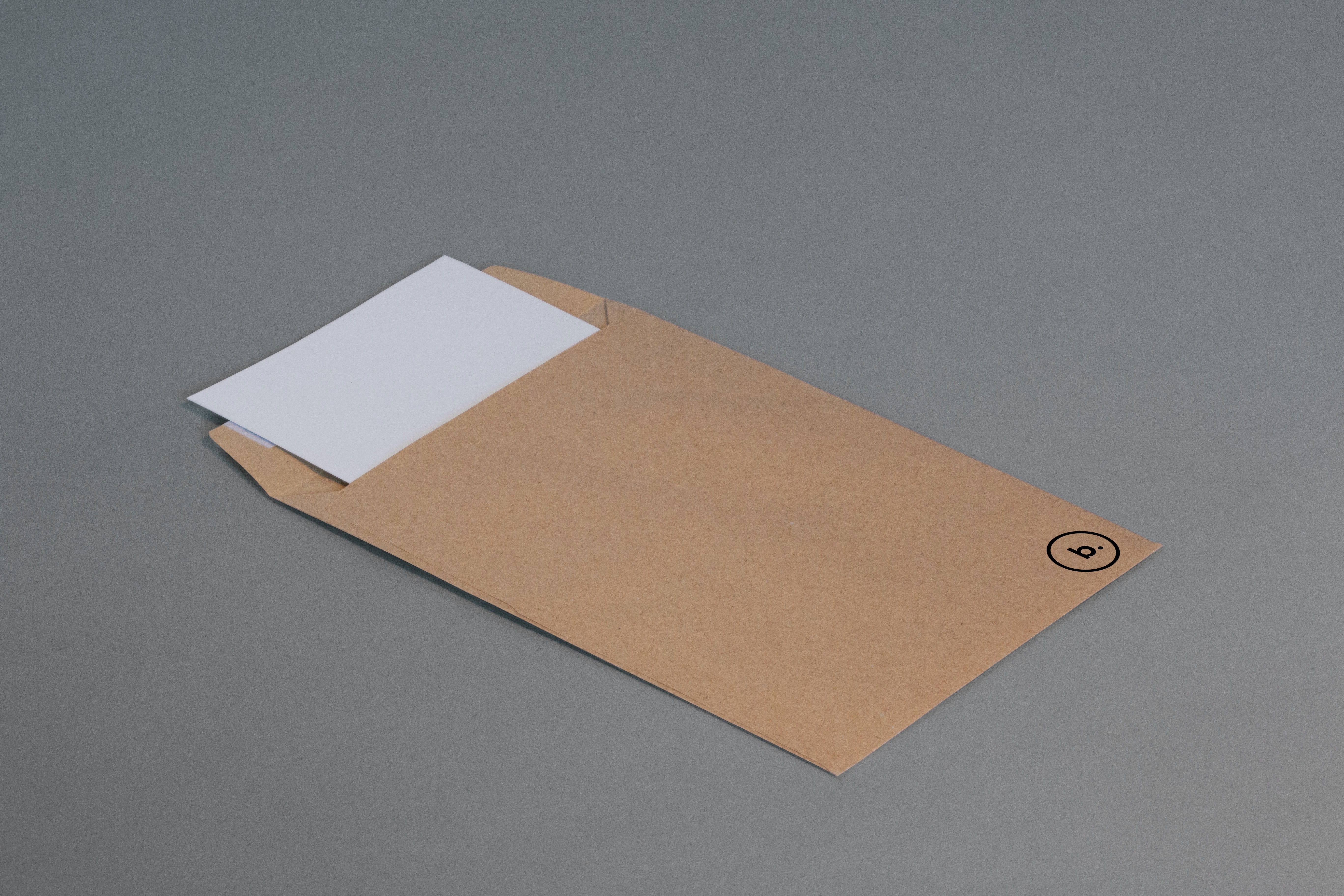Letter going into an envelope