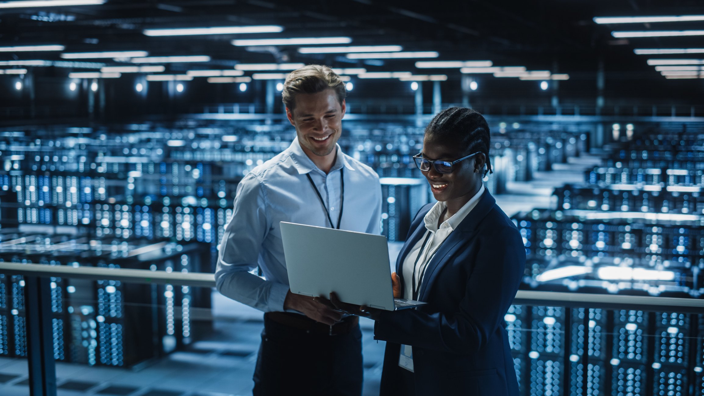 Coworkers in server room