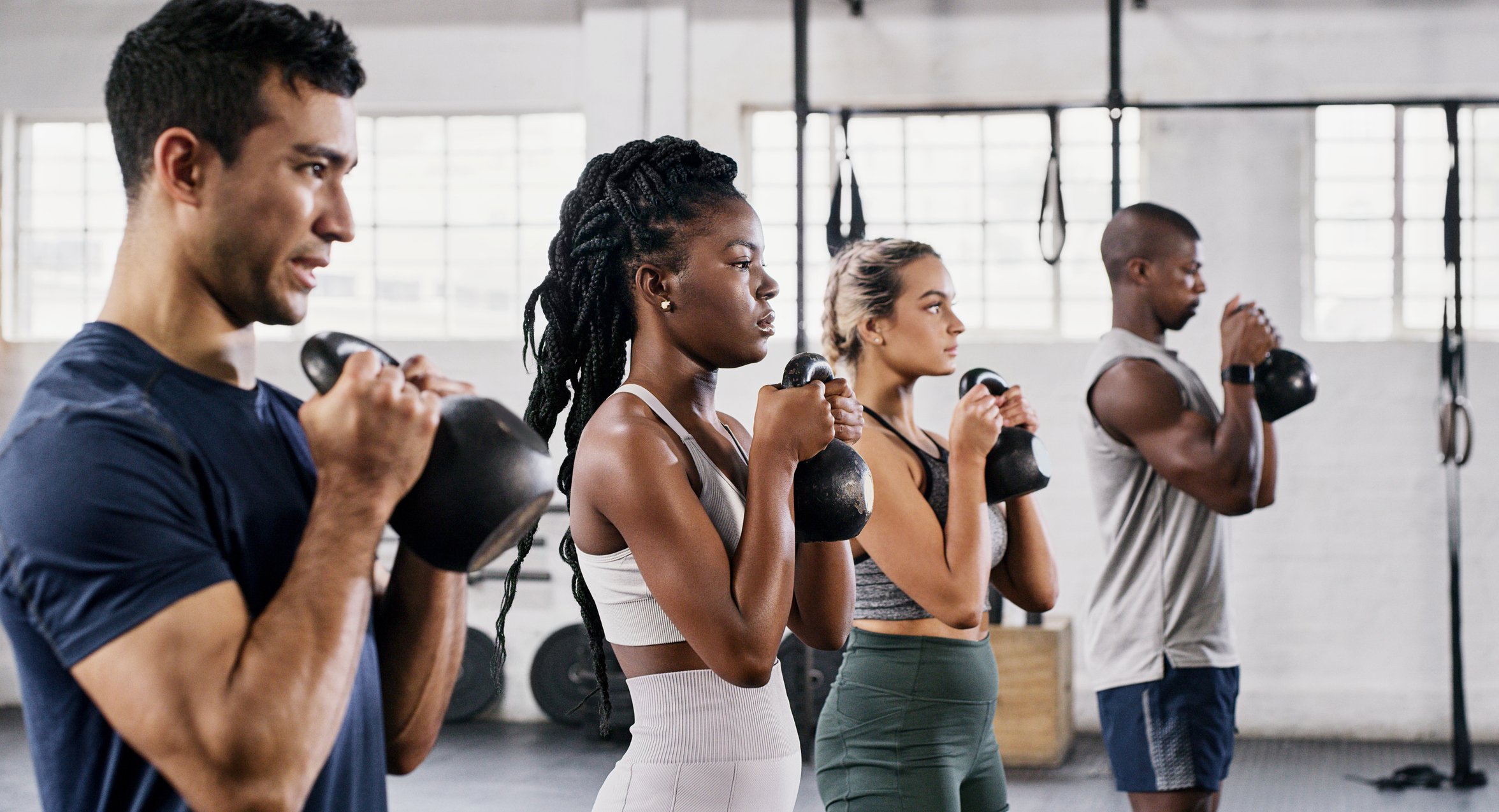People exercising with weights.