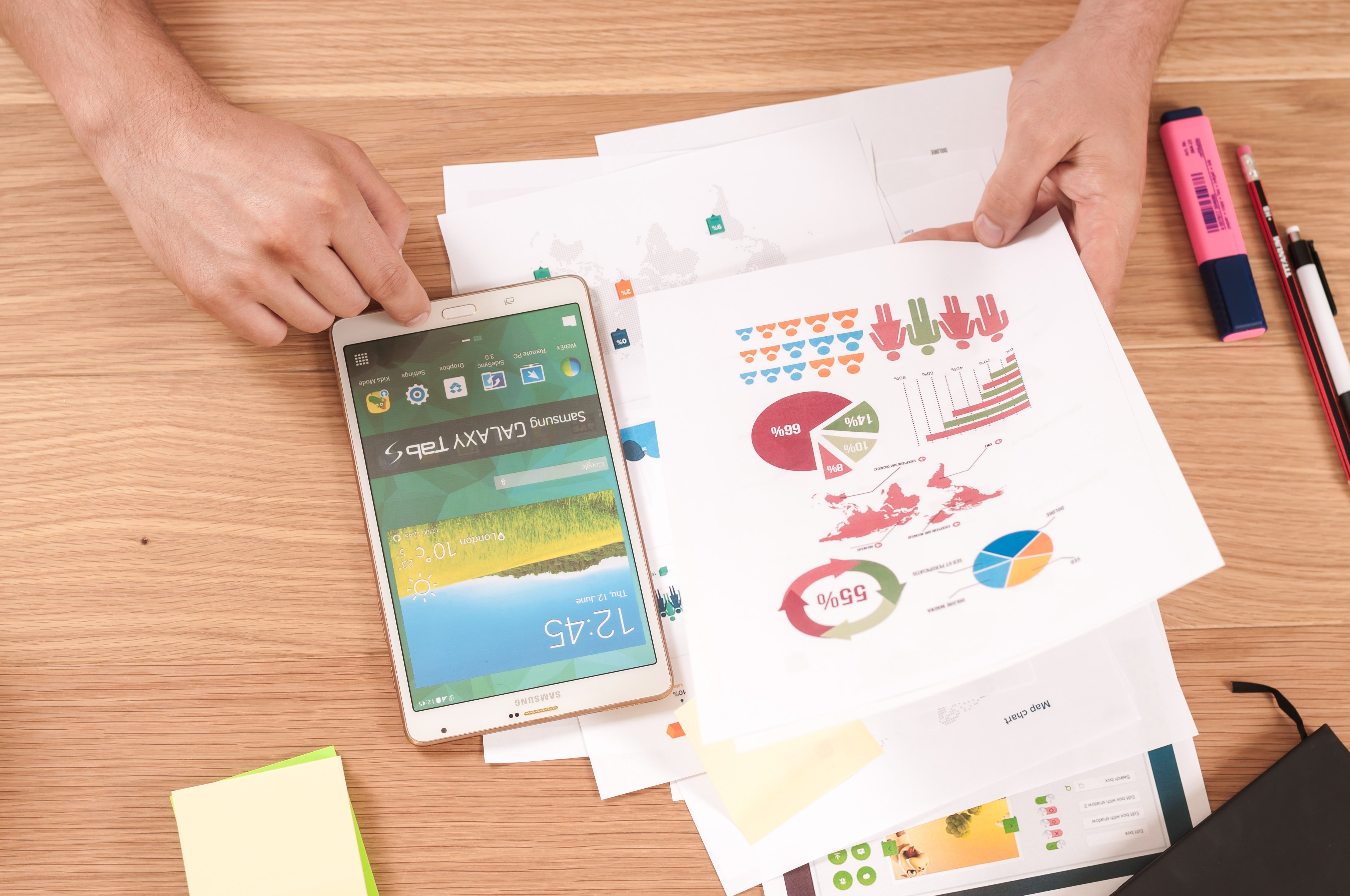 a person reviews several different types of printed charts