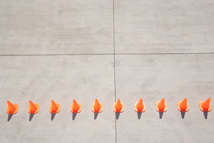 Row of traffic cones to demonstrate consistency