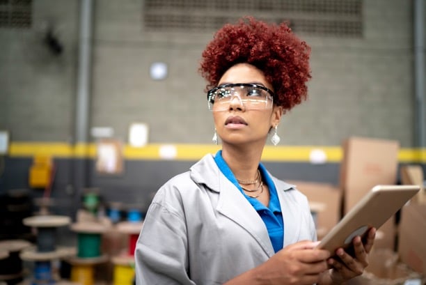 Photo of a professional in a manufacturing facility.