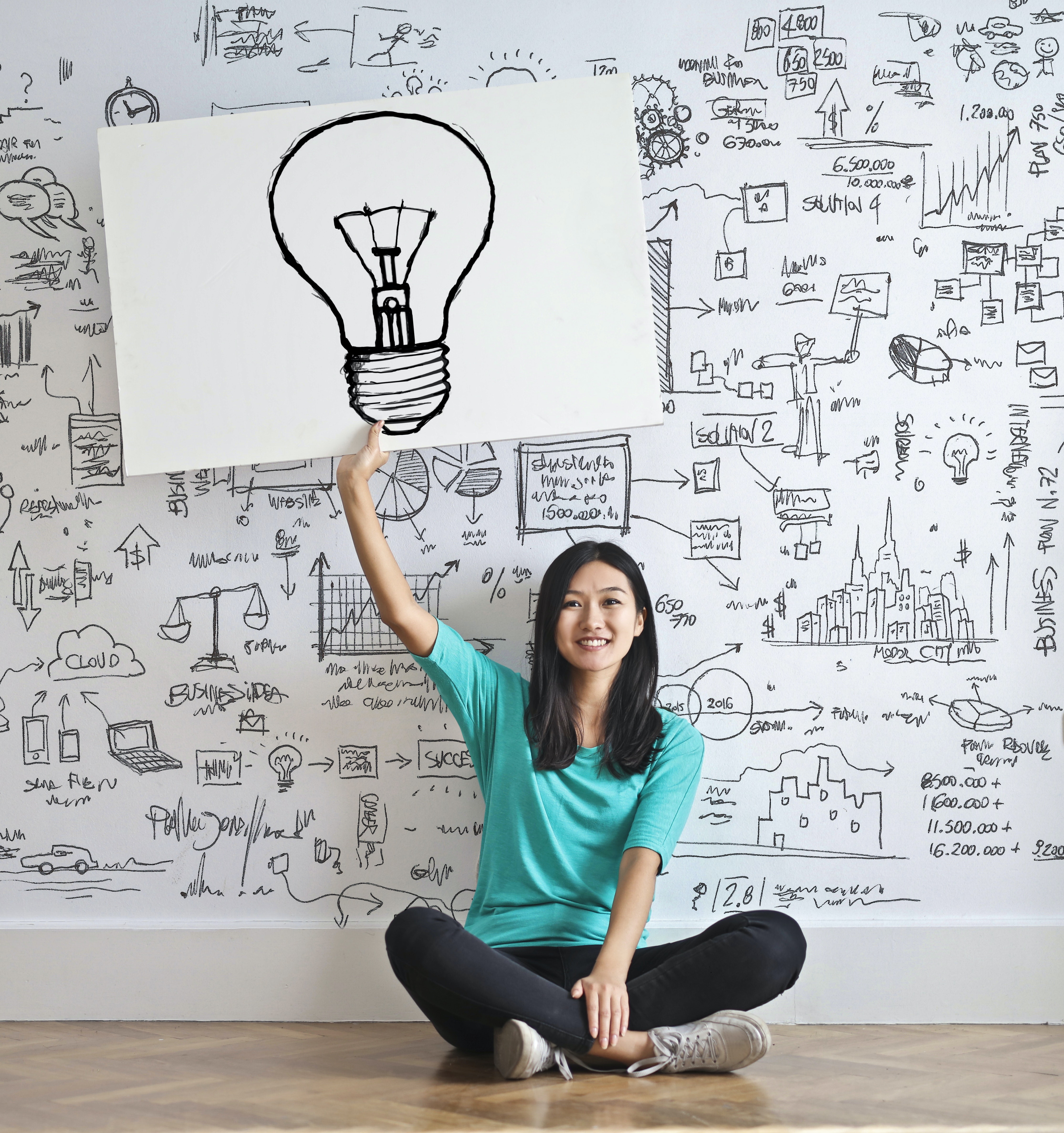 Photo by Andrea Piacquadio on Pexels - woman holding lightbulb