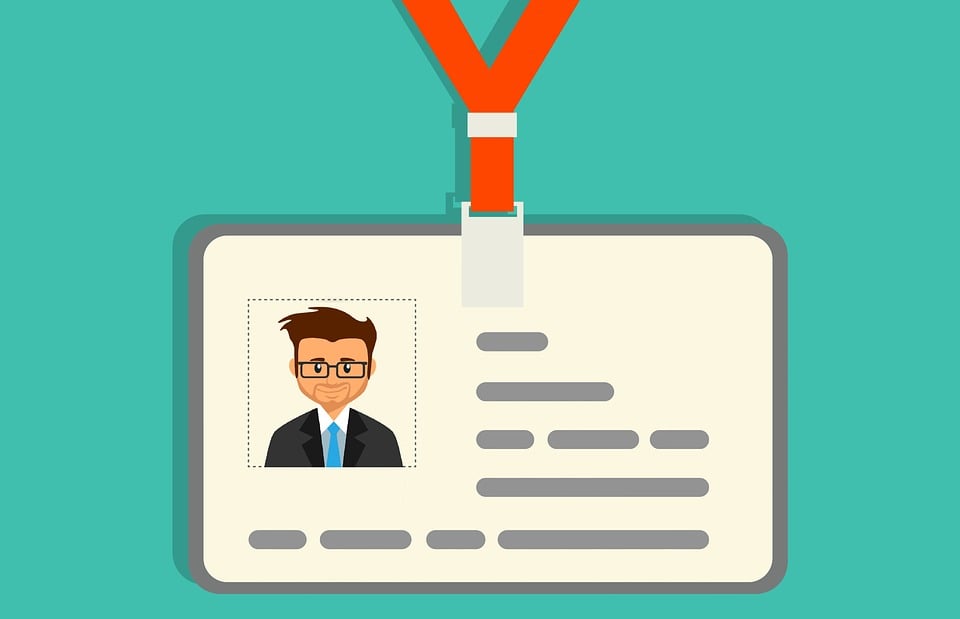 Illustration showing the id badge of with a head-shot of a man wearing a suit and glasses.