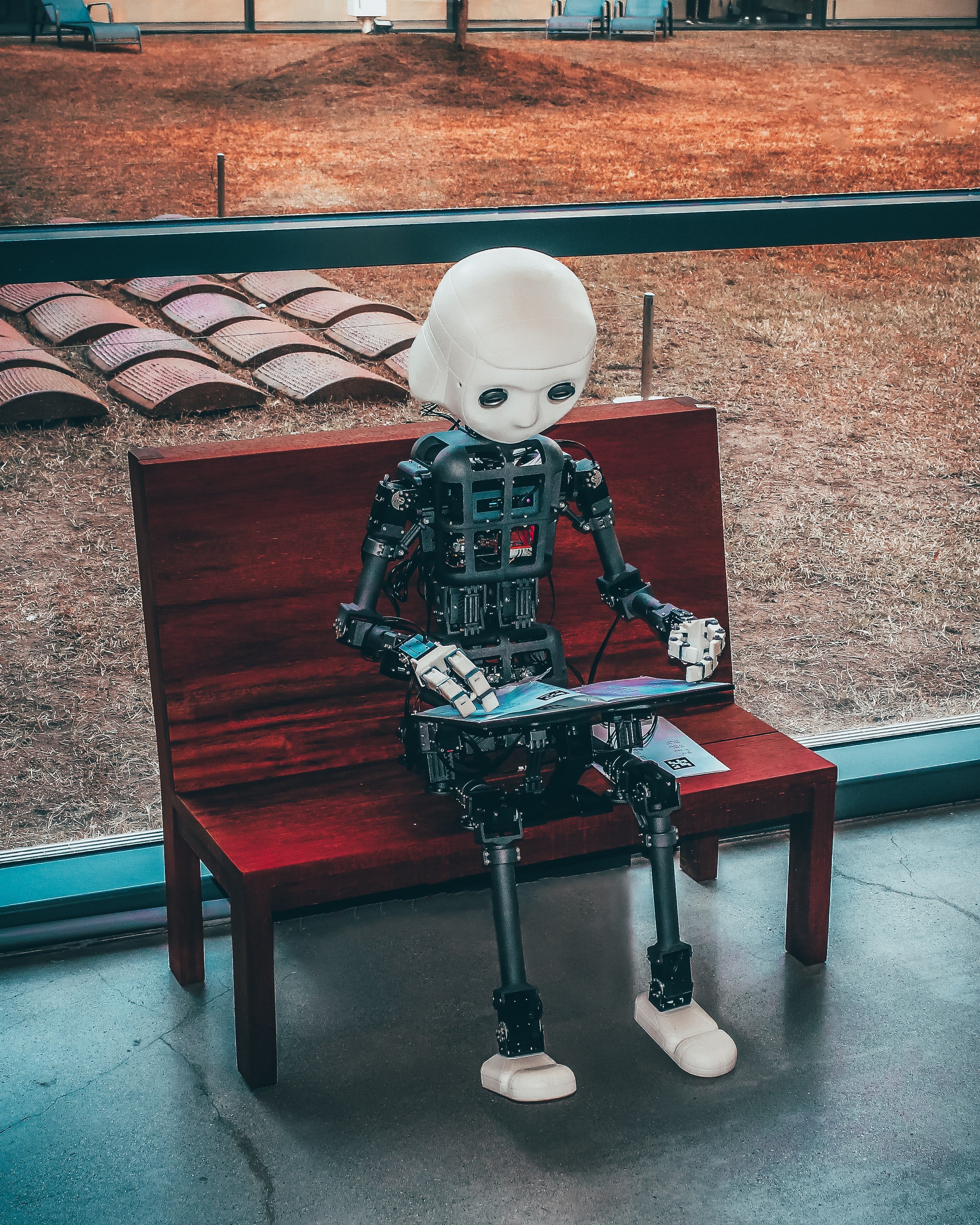 Picture of a robot using a tablet