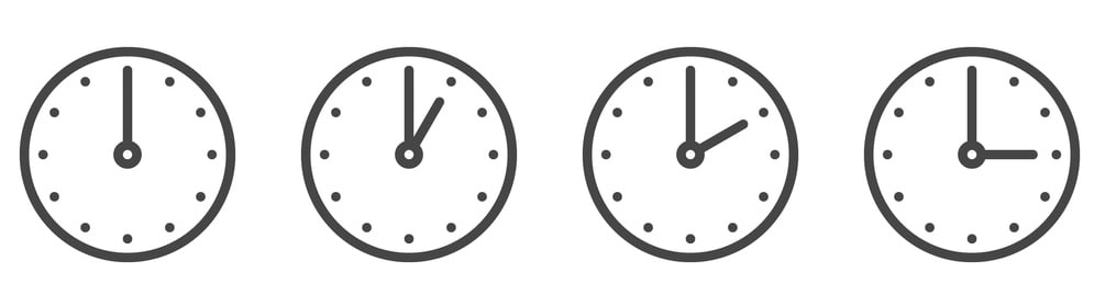 Illustration of four clock faces with different times.