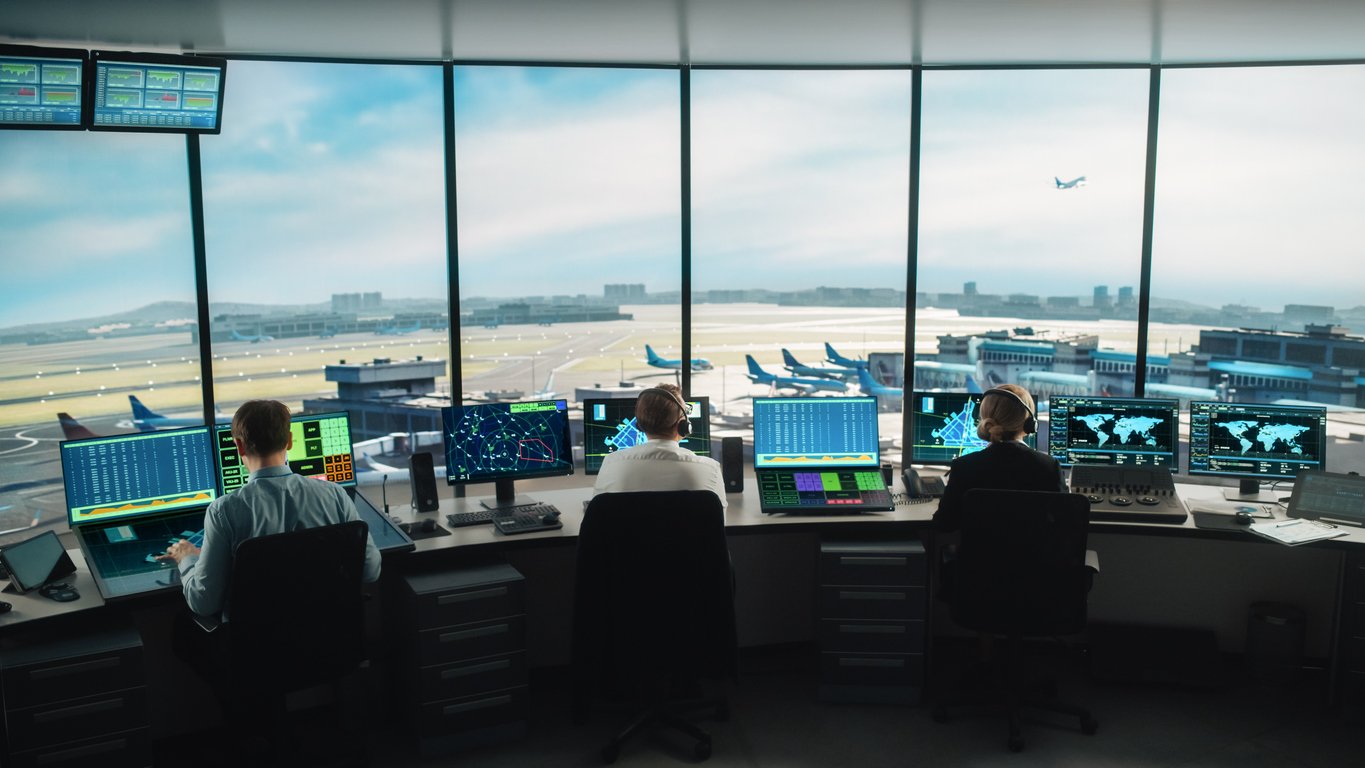 office with a view looking out on to an airport runway