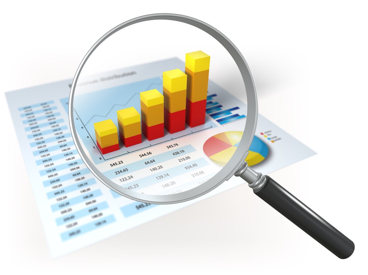 Magnifying glass looking into a bar chart