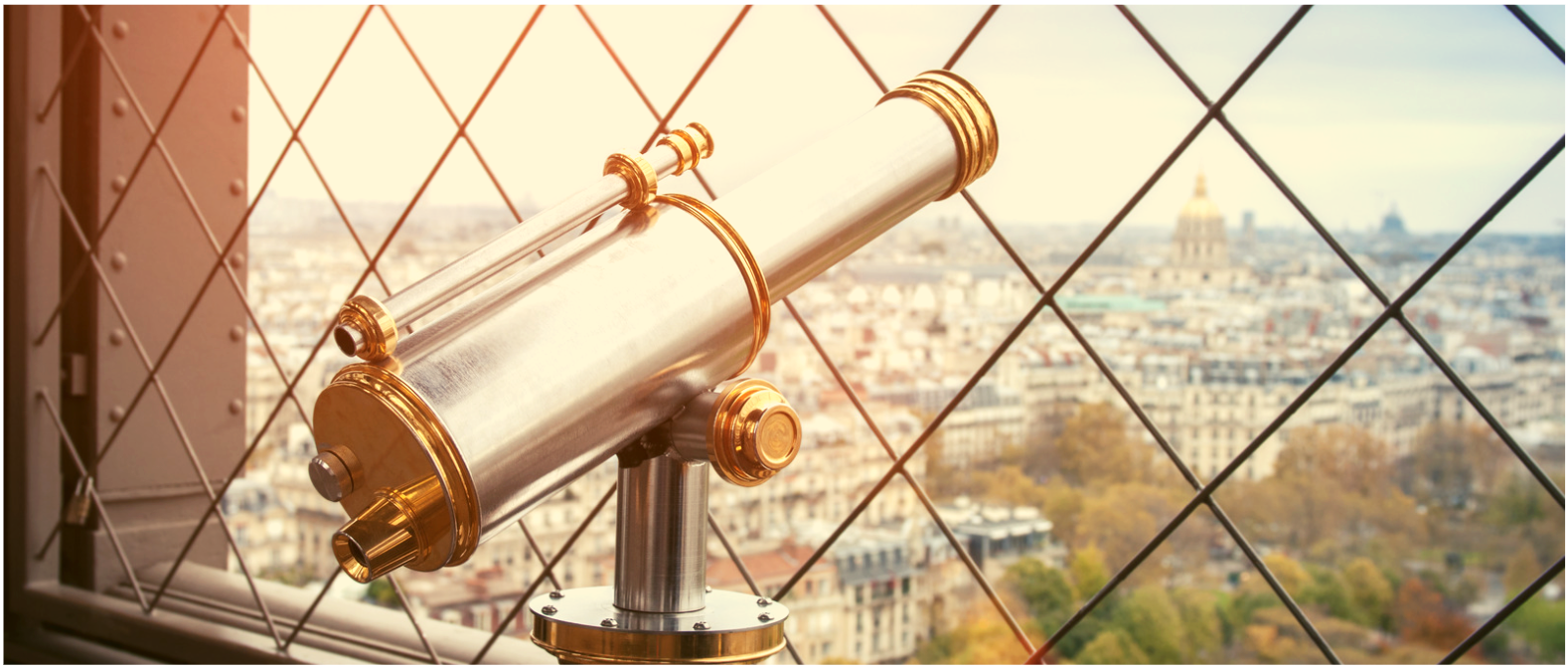 Telescope pointing to a city