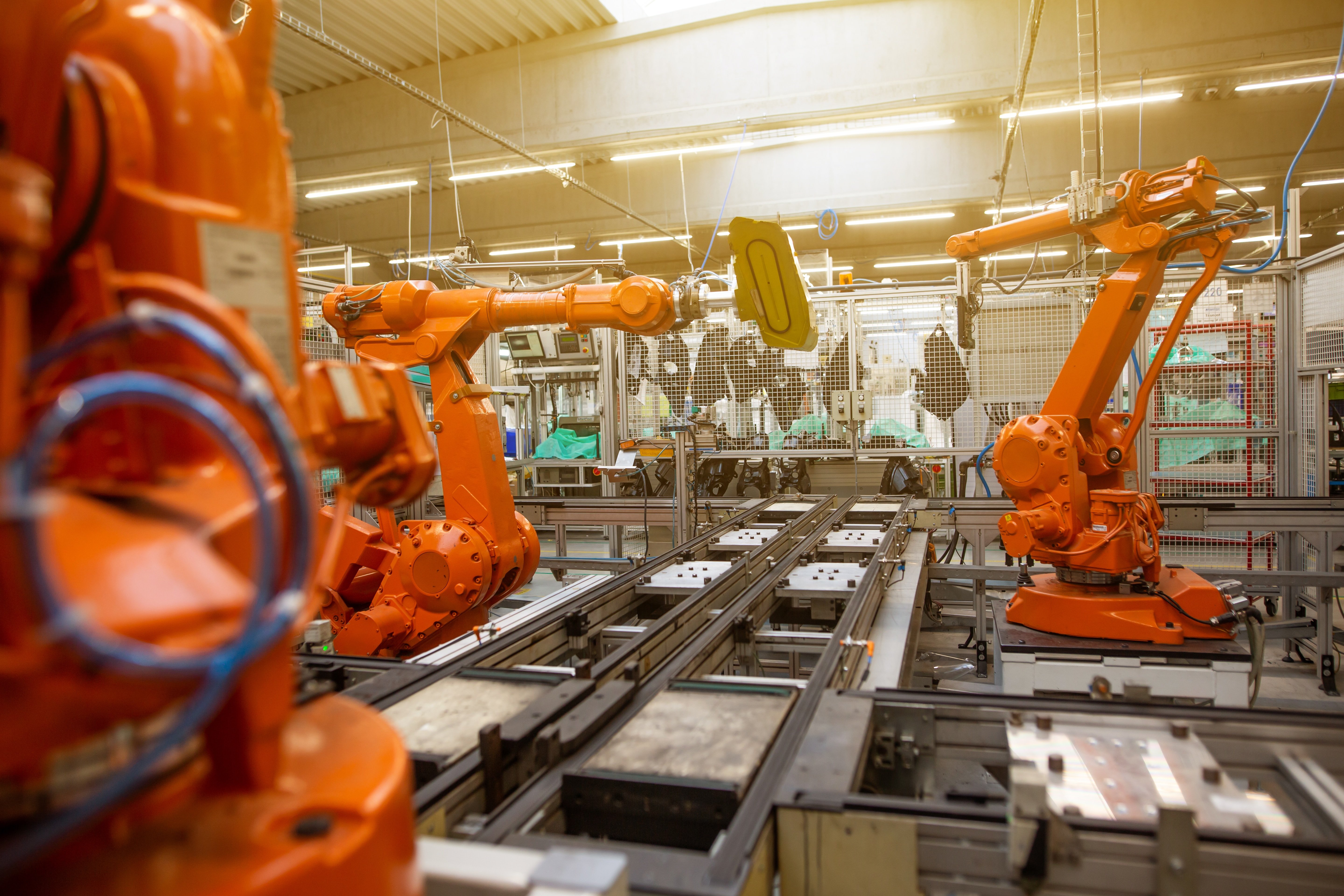 The image shows a automated production line.