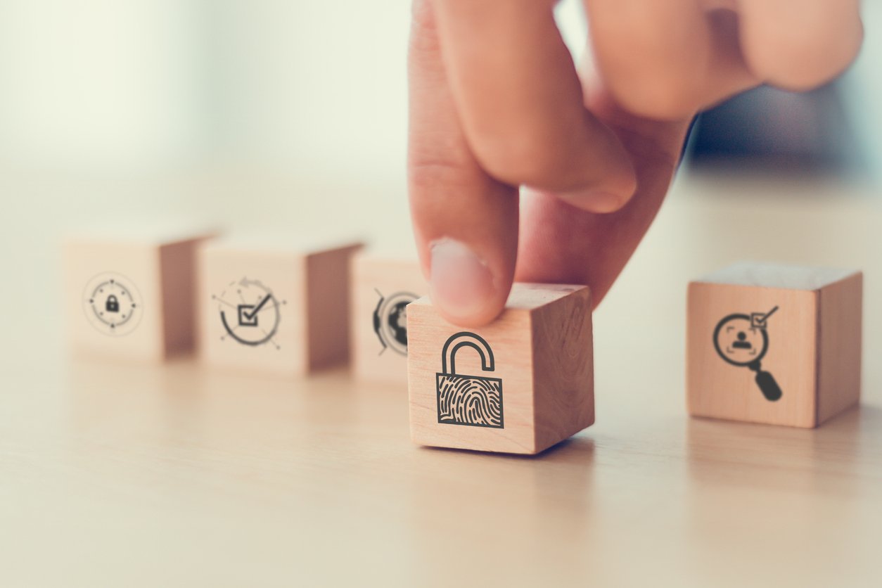 The image shows a wooden block being moved forward with a keylock, which symbolizes increased security.