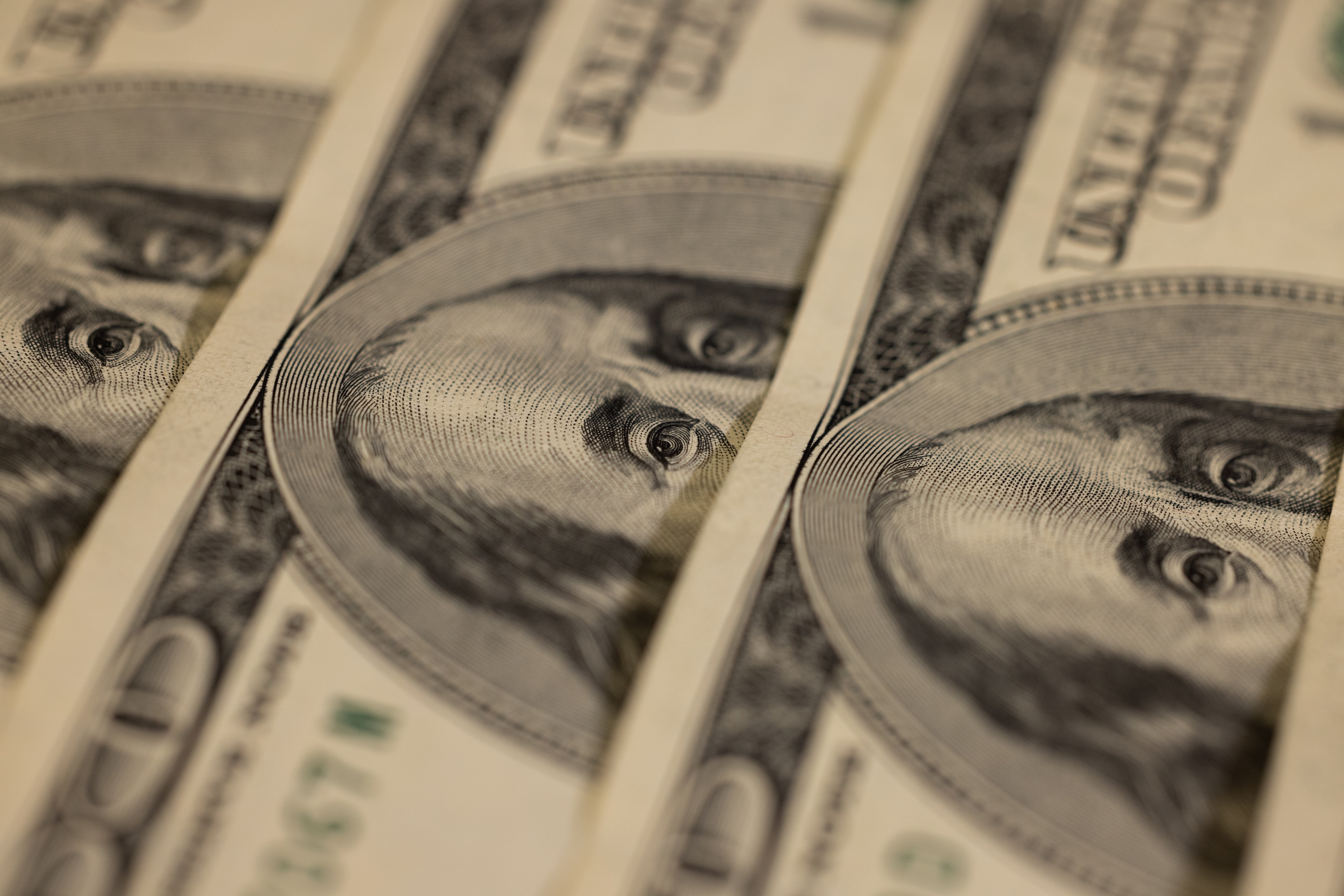 Image shows American banknotes.