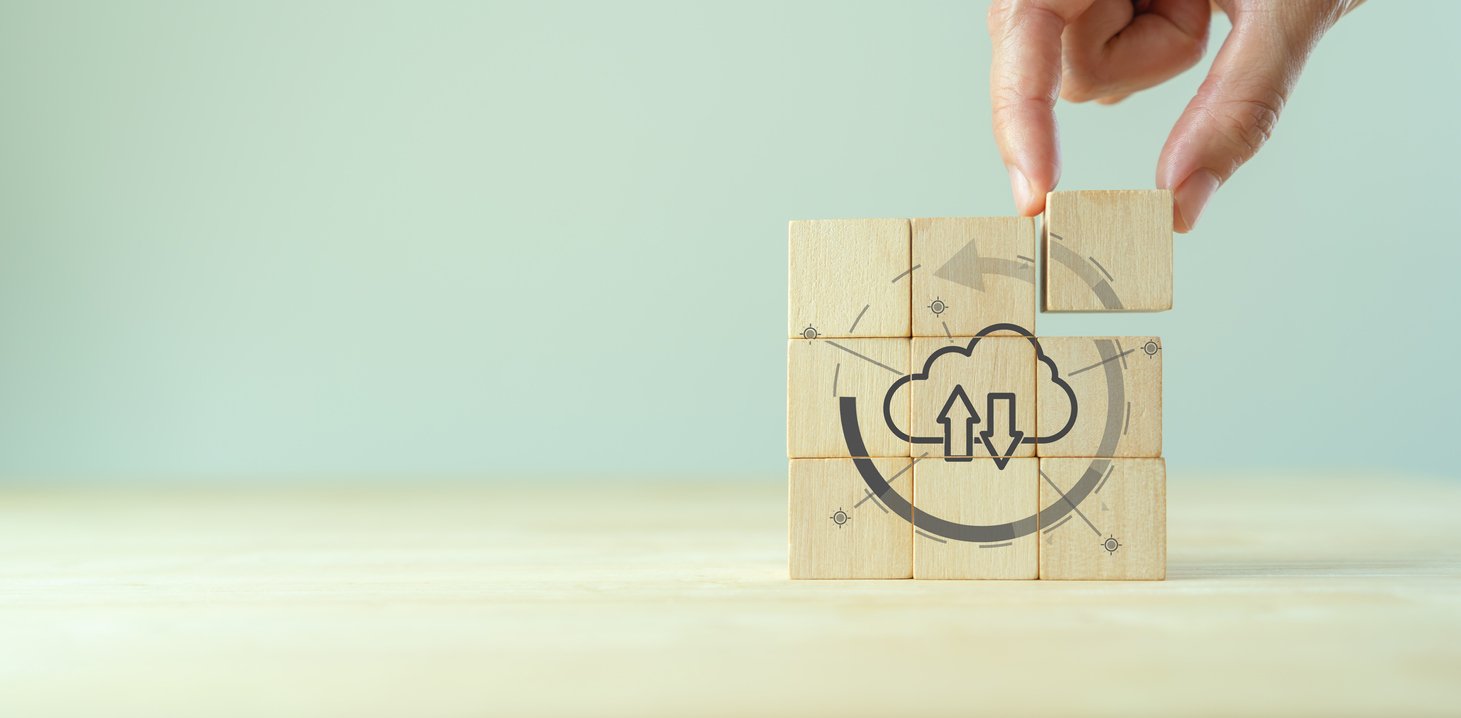 The image displays the cloud logo, composed of nine wooden blocks.