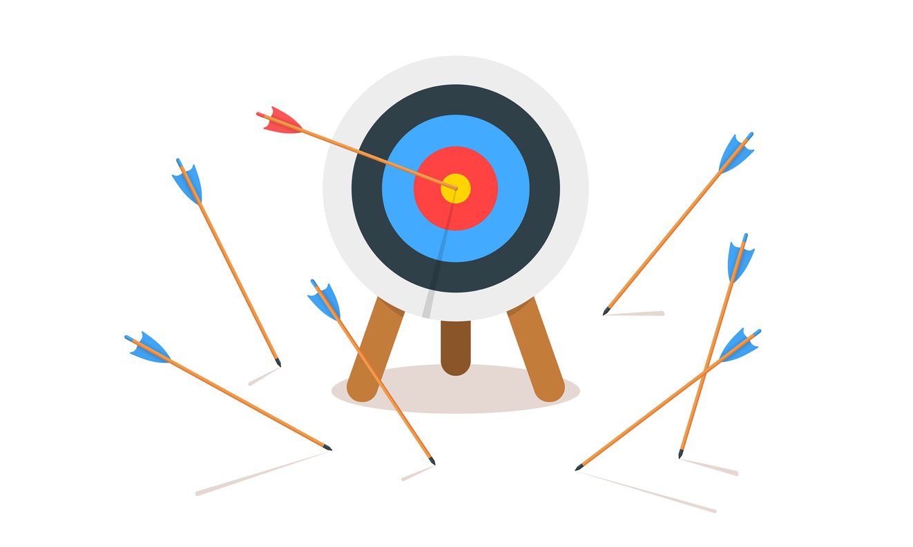 Archery target with arrows that missed the bullseye