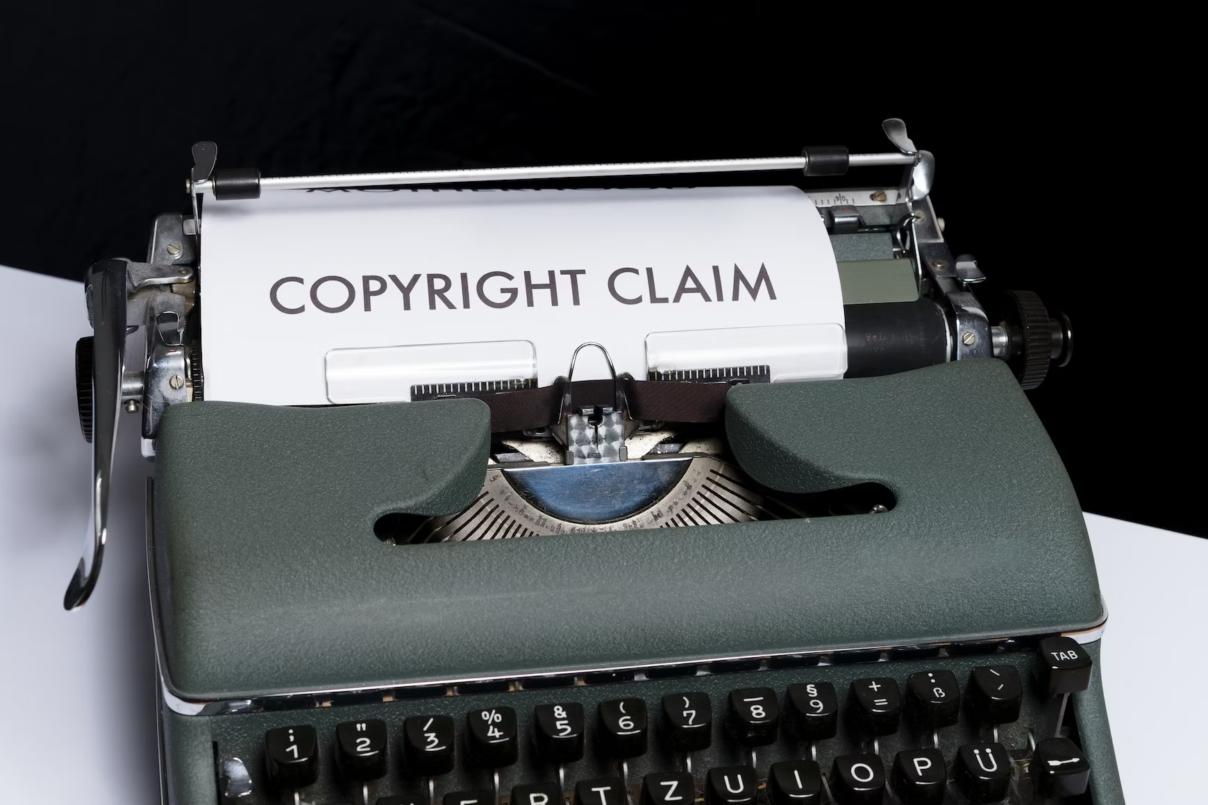 Image of the words “copyright claim” printed in a typewriter