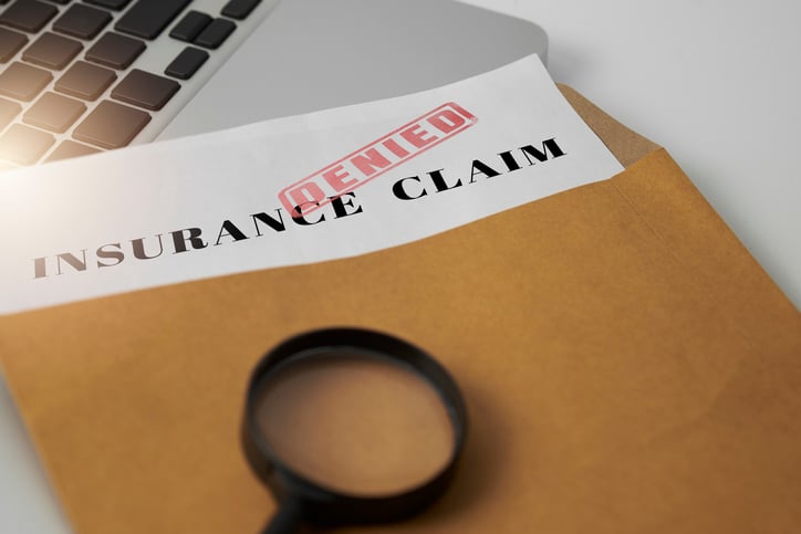 A photo of insurance claim being denied.