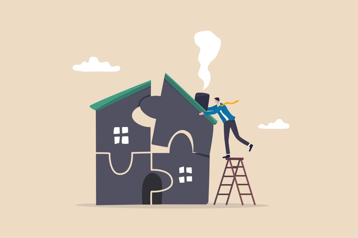 Cartoon image of a house being put together and being rebuilt