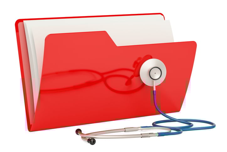 Red file folder with documents and stethoscope attached to the front