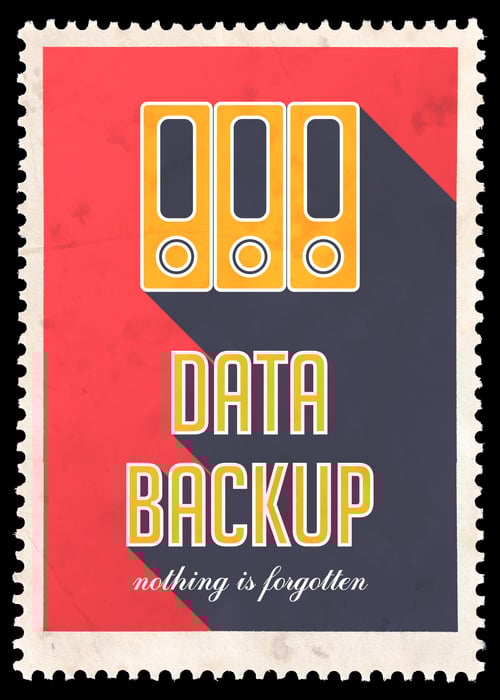 image of stamp that says data backup and has hard drives