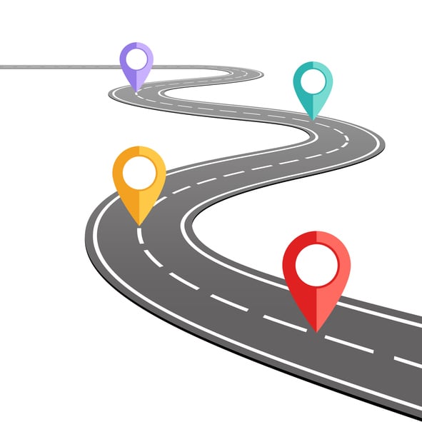 abstract road with four colored way points spread along it
