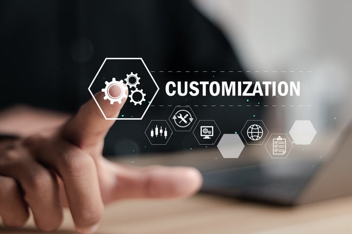 Image showing the word "customization" being touched by a human finger