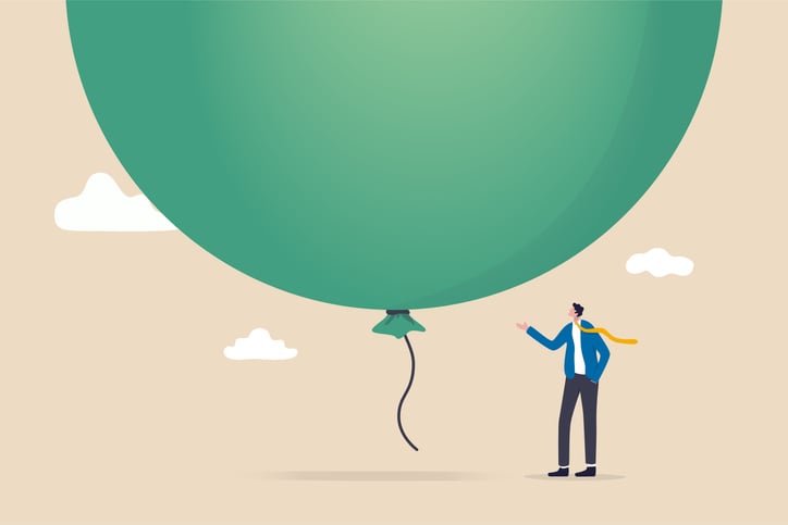 Image of a cartoon man letting go of a giant, green balloon