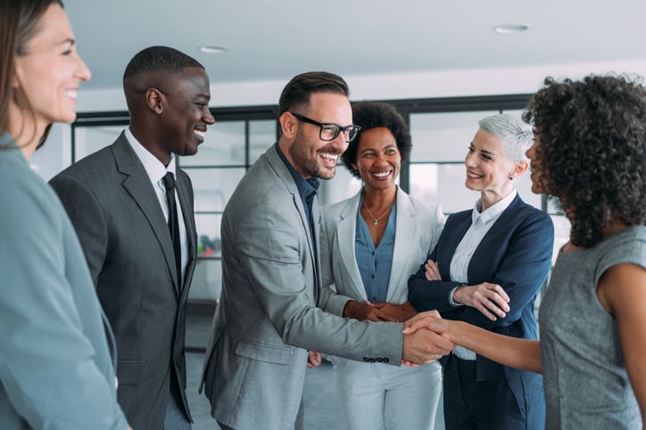 Image of business people being introduced