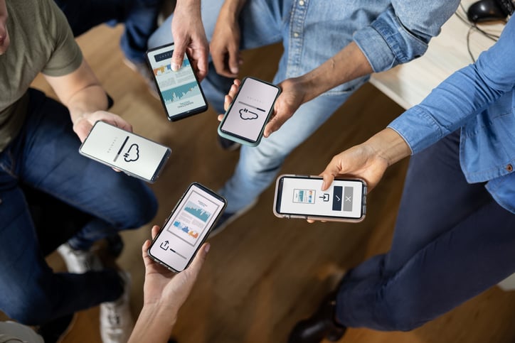 Several people access an app on the cloud.