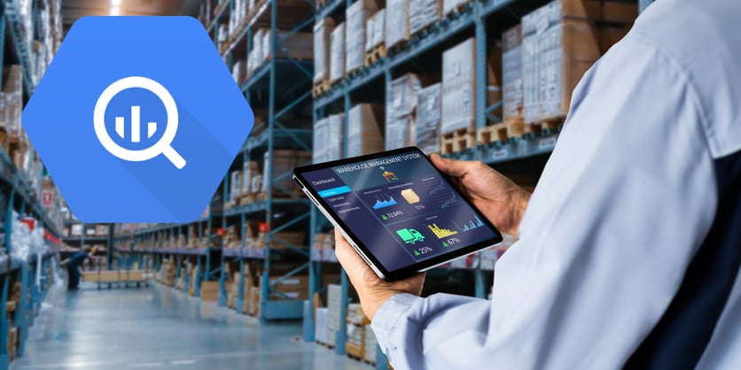 A logo of Google BigQuery superimposed on the picture of a warehouse where a person analyzes data on their tablet device.