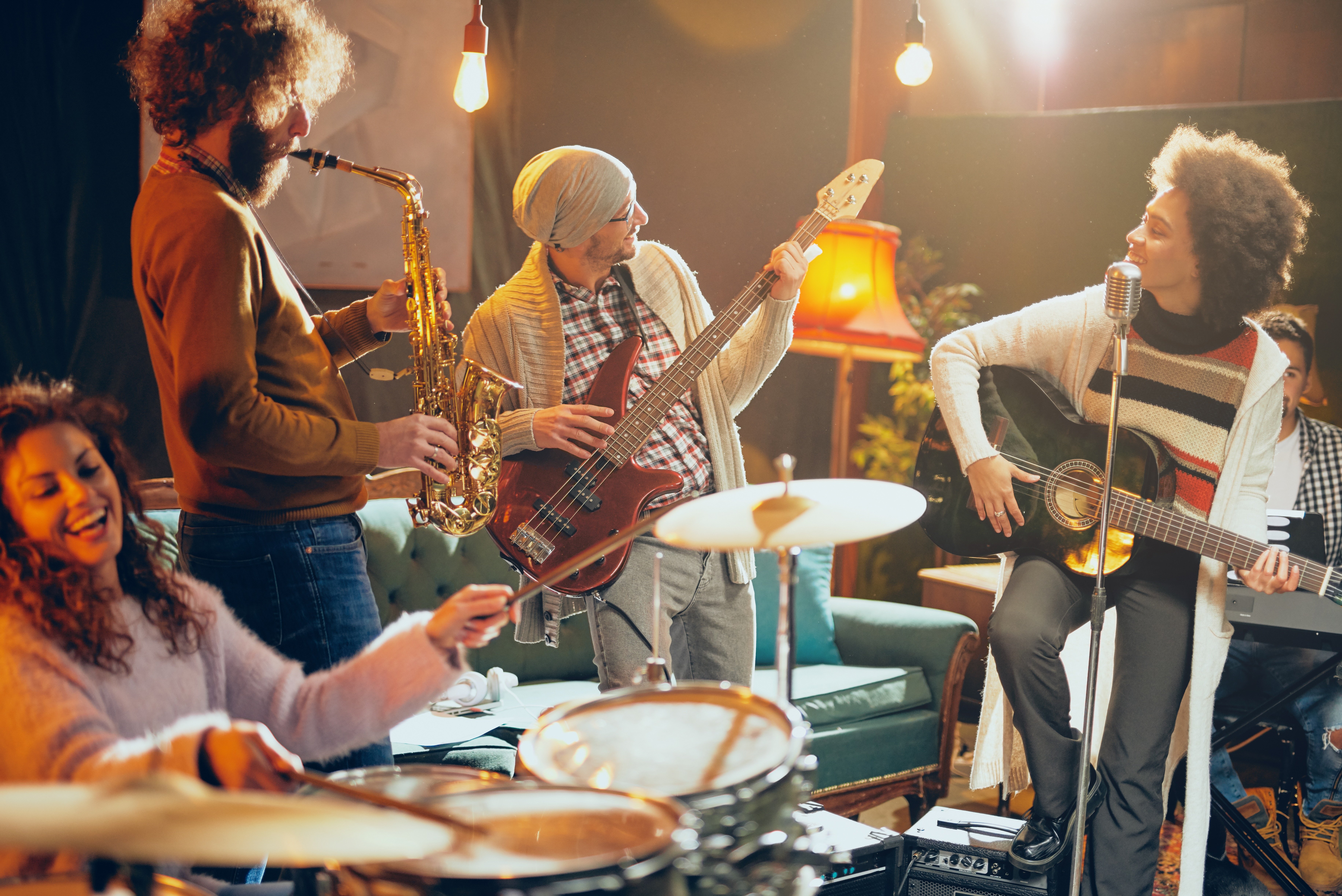 Image showing a band of musicians playing different instruments.
