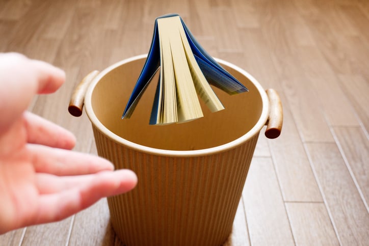 Discard old books in a bin