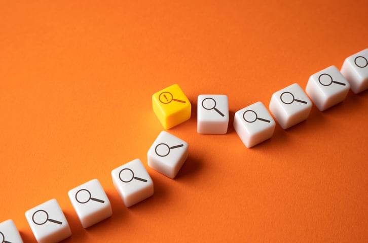Image showing cubes with magnifying glasses ensuring all are the same